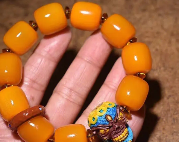 真假黄金甲手串区别