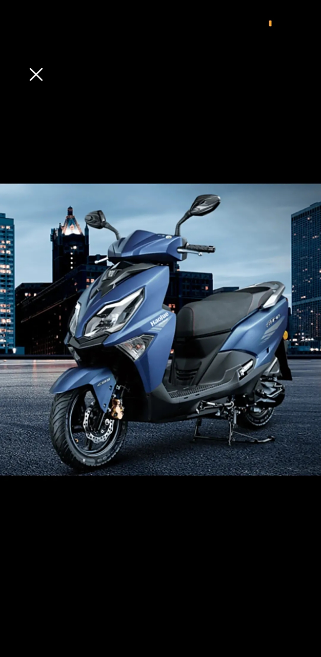 今天陪我老婆去看125踏板车,看了铃木uy(10880包牌,有保险杠,后箱)