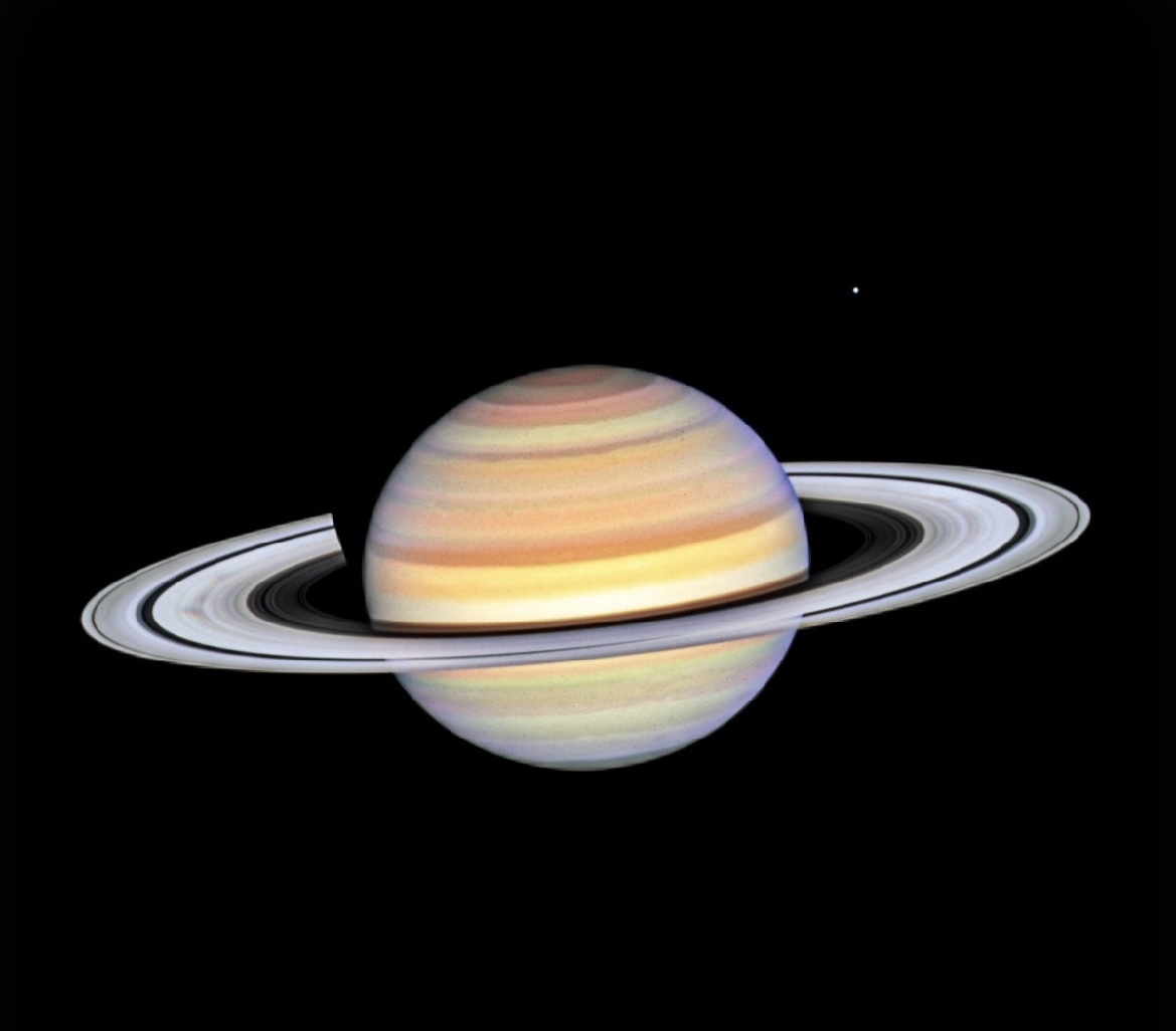 nasa公布哈勃望远镜拍摄的土星照片,揭示土星环的神秘"辐条"