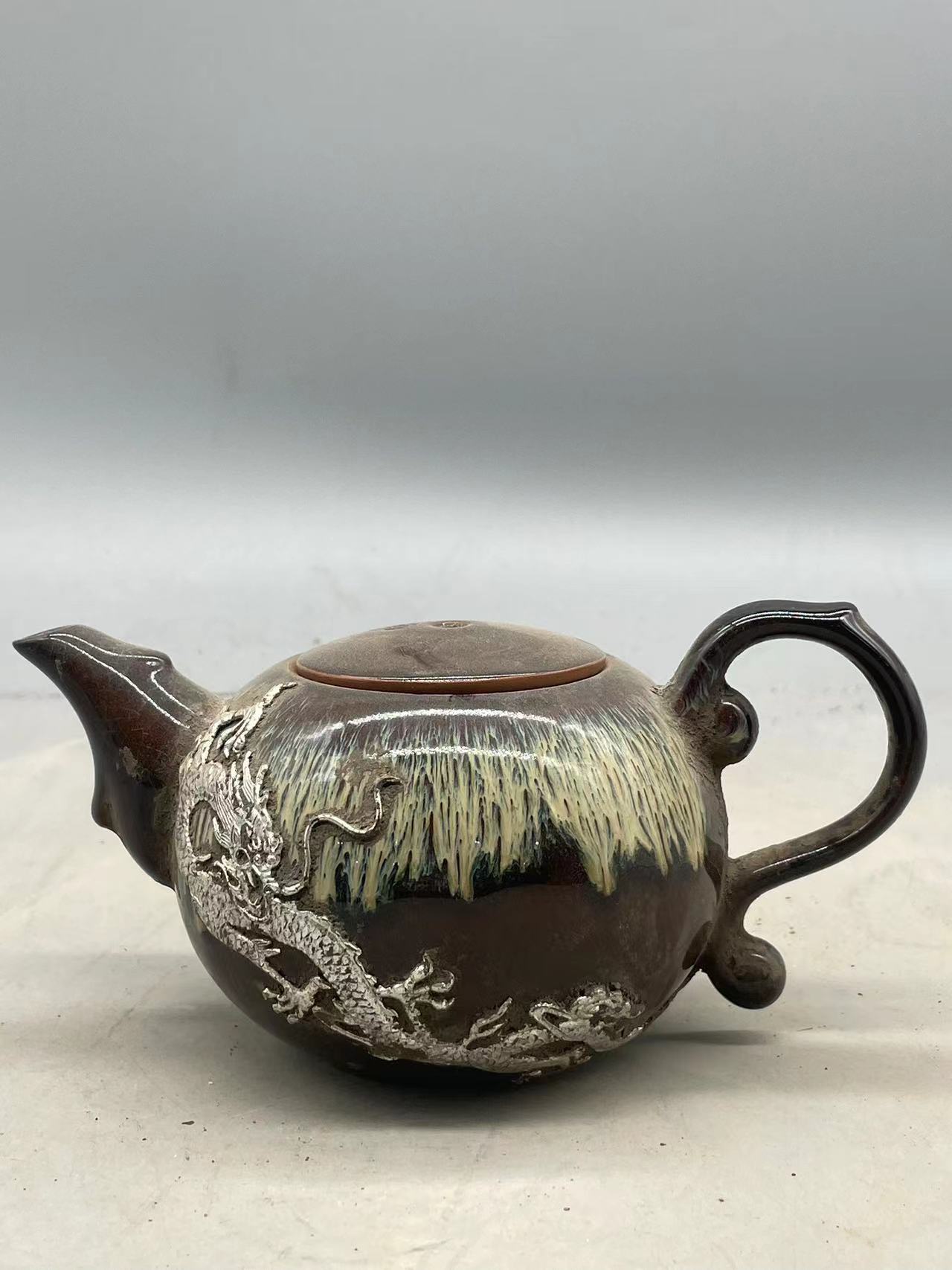 钧瓷镶银浮雕龙纹茶壶