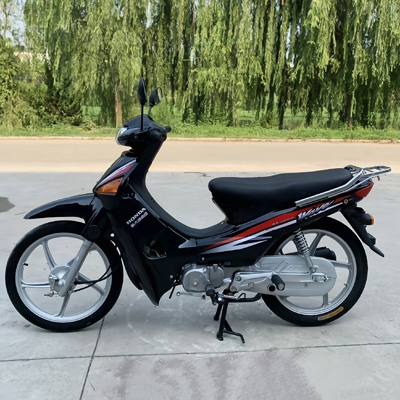 百度秋冬打卡挑战赛# 我的本田威武110t已经跑了四千多公里了,上次换