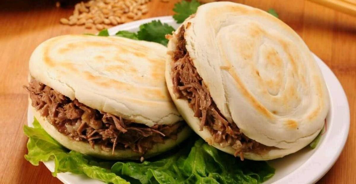 同样是饼加肉,为什么驴肉火烧逐渐没落,西安肉夹馍火遍全国?