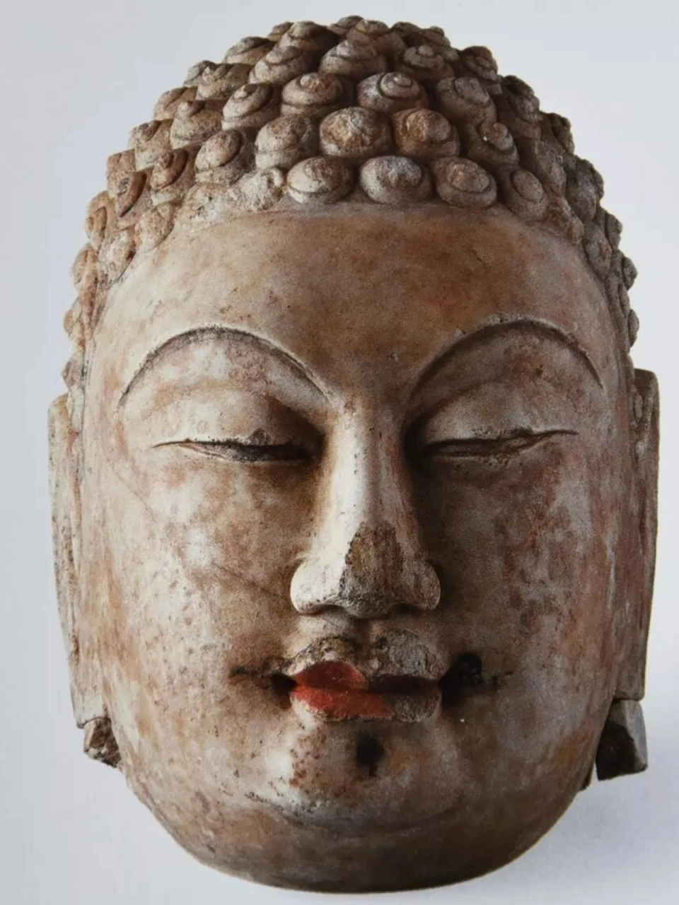 想要从佛头辨别北齐造像,首先要了解北齐造像的特点.