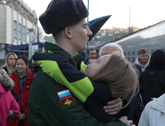 俄罗斯迎接乌克兰烈士图片