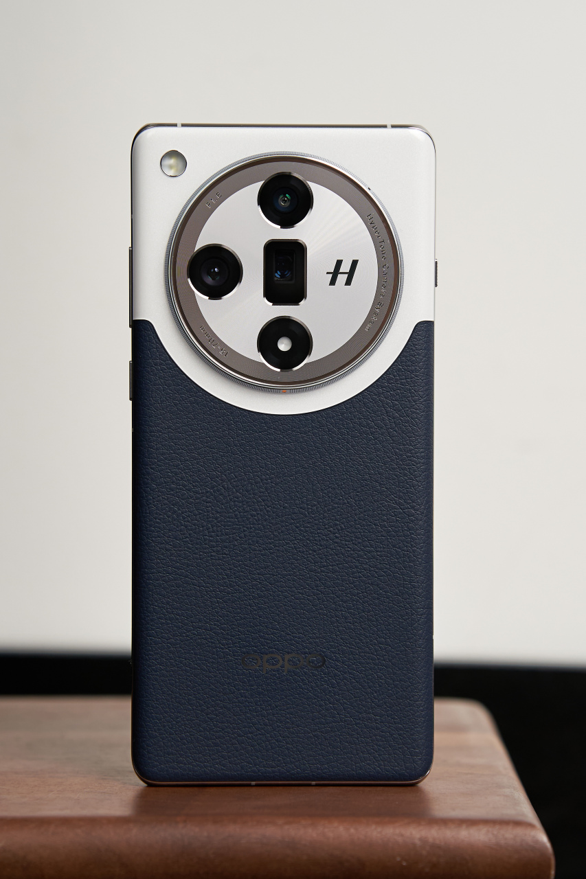 华为p60art和mate60pro外观独特,oppofindx7标准版背部采用大圆环设计