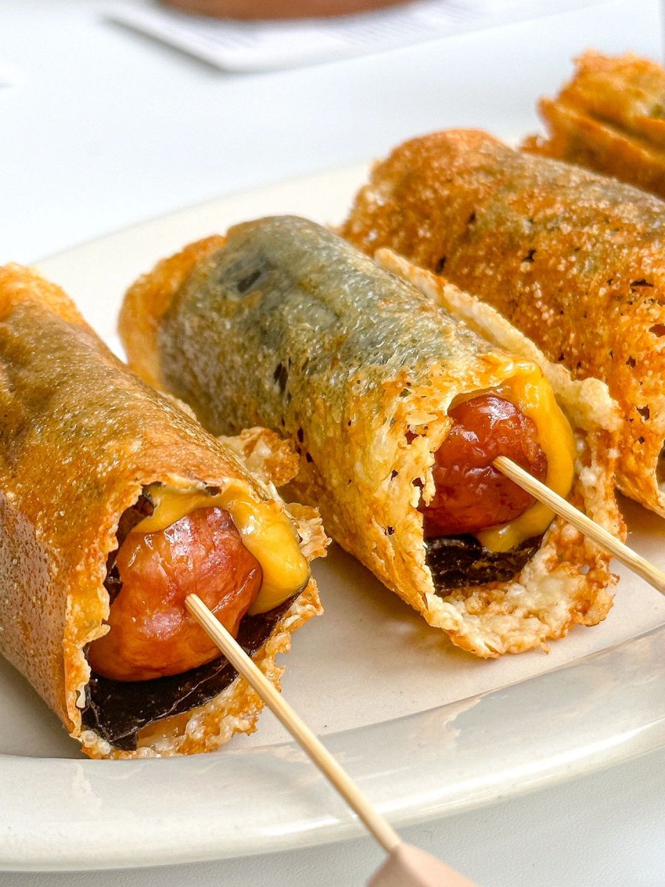 脆皮芝士烤肠卷外脆里爆汁 食材烤肠海苔芝士片芝士碎 谁能拒绝外面煎