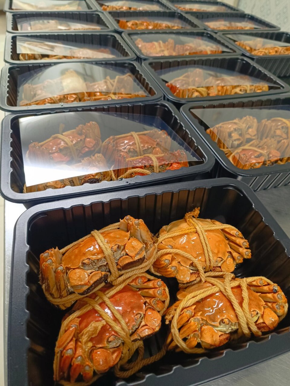 熟醉蟹地道无锡味  熟醉蟹是无锡地区一道非常有名的传统美食,它的