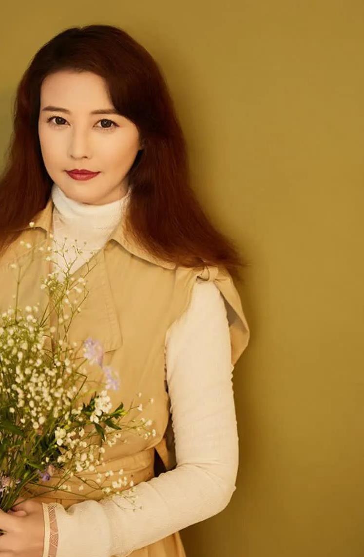 周海媚,1966年生于香港,是一位杰出的女演员.