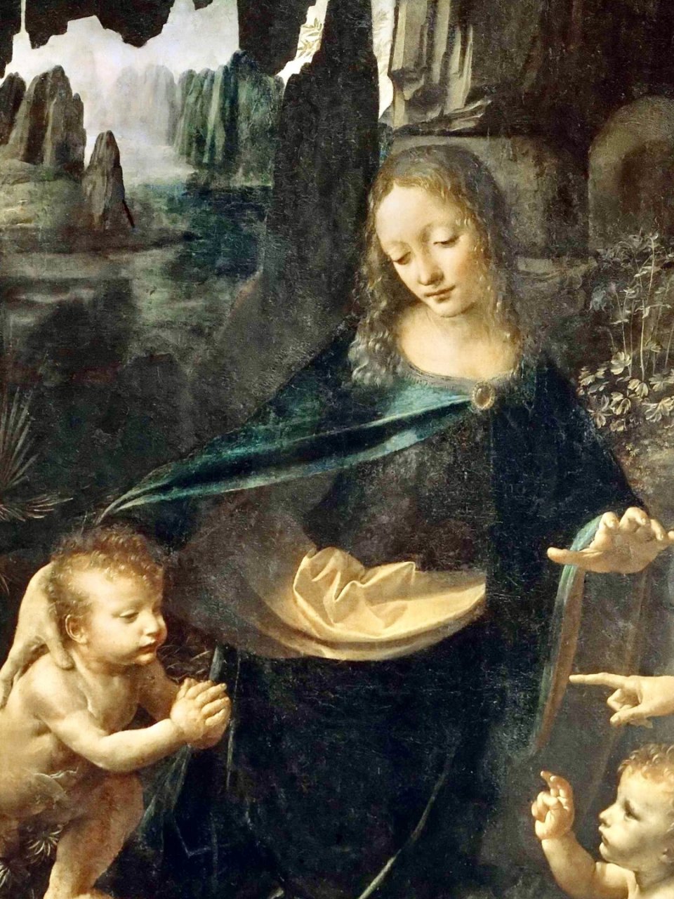 让我想起了妈妈的爱  《岩间圣母》是达·芬奇的杰出作品,画面描绘