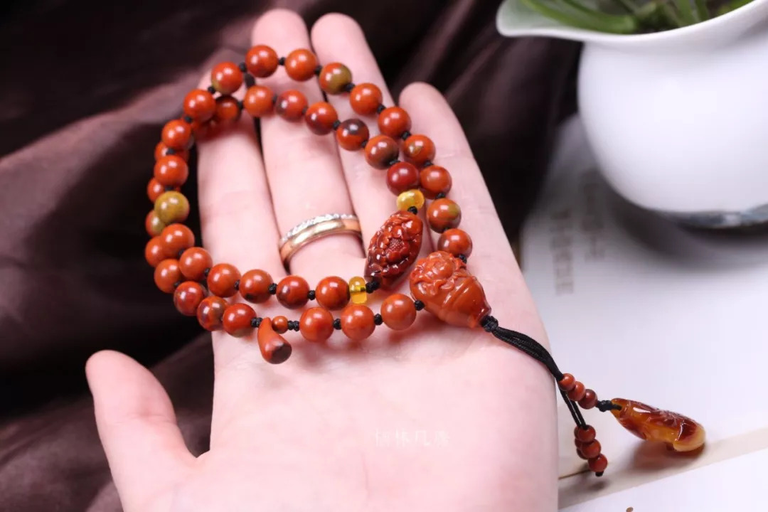 云南昭通包浆南红特点,昭通包浆料主要特点