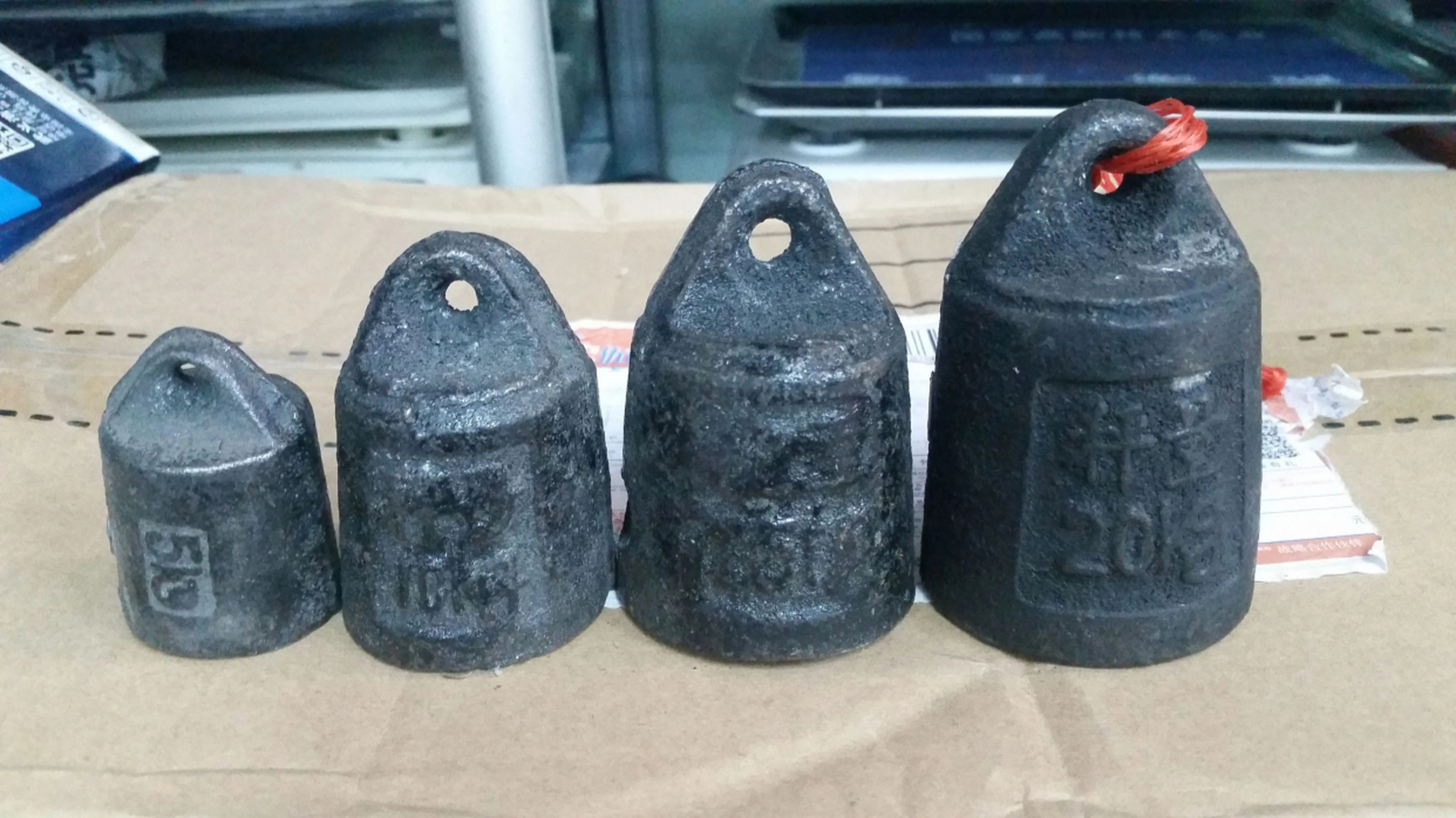 秤砣与称铊,虽同为测重工具却各具特色.