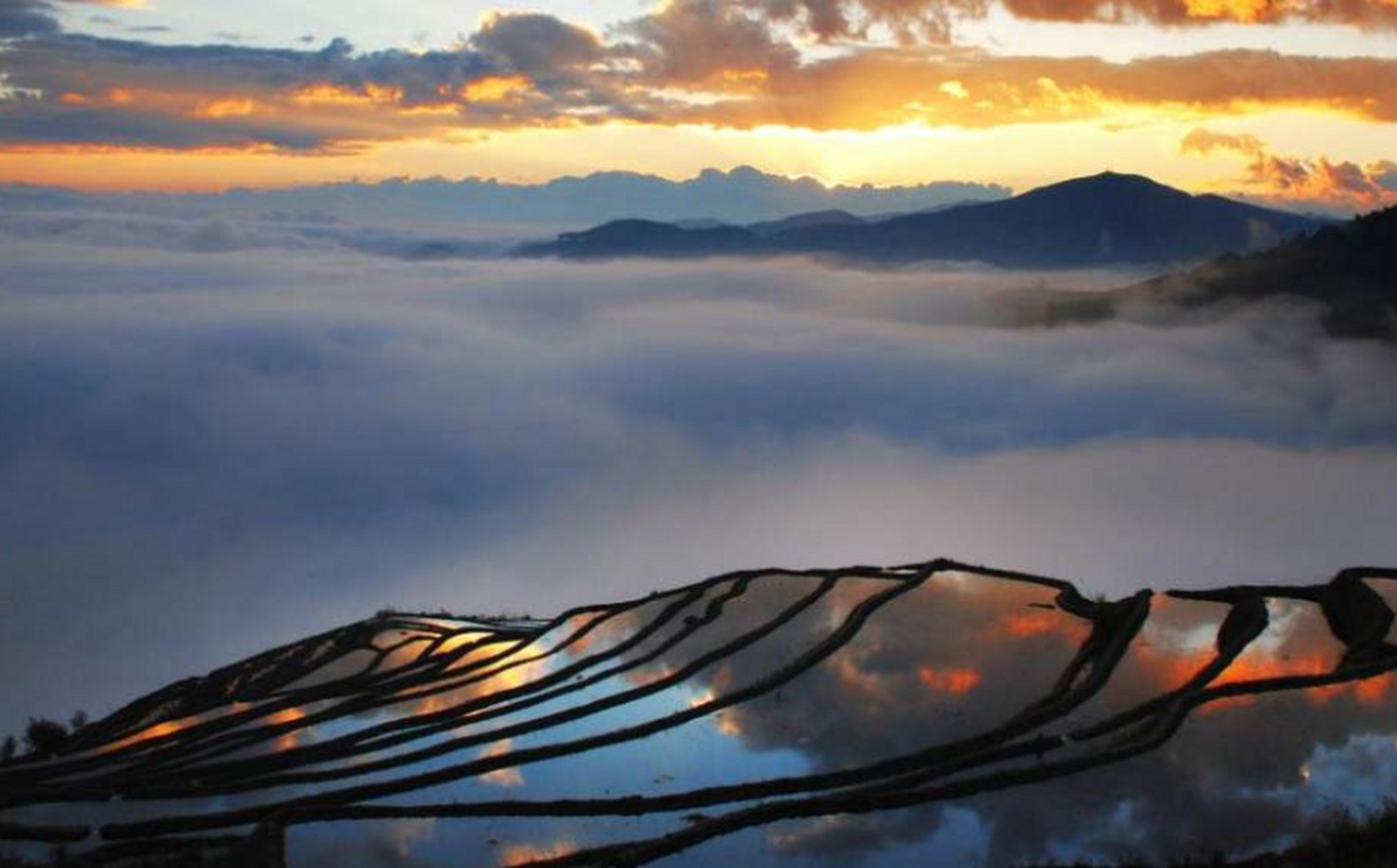 元江拥有温暖的气候,丰富的自然和人文景观,包括那诺梯田,红河谷热海