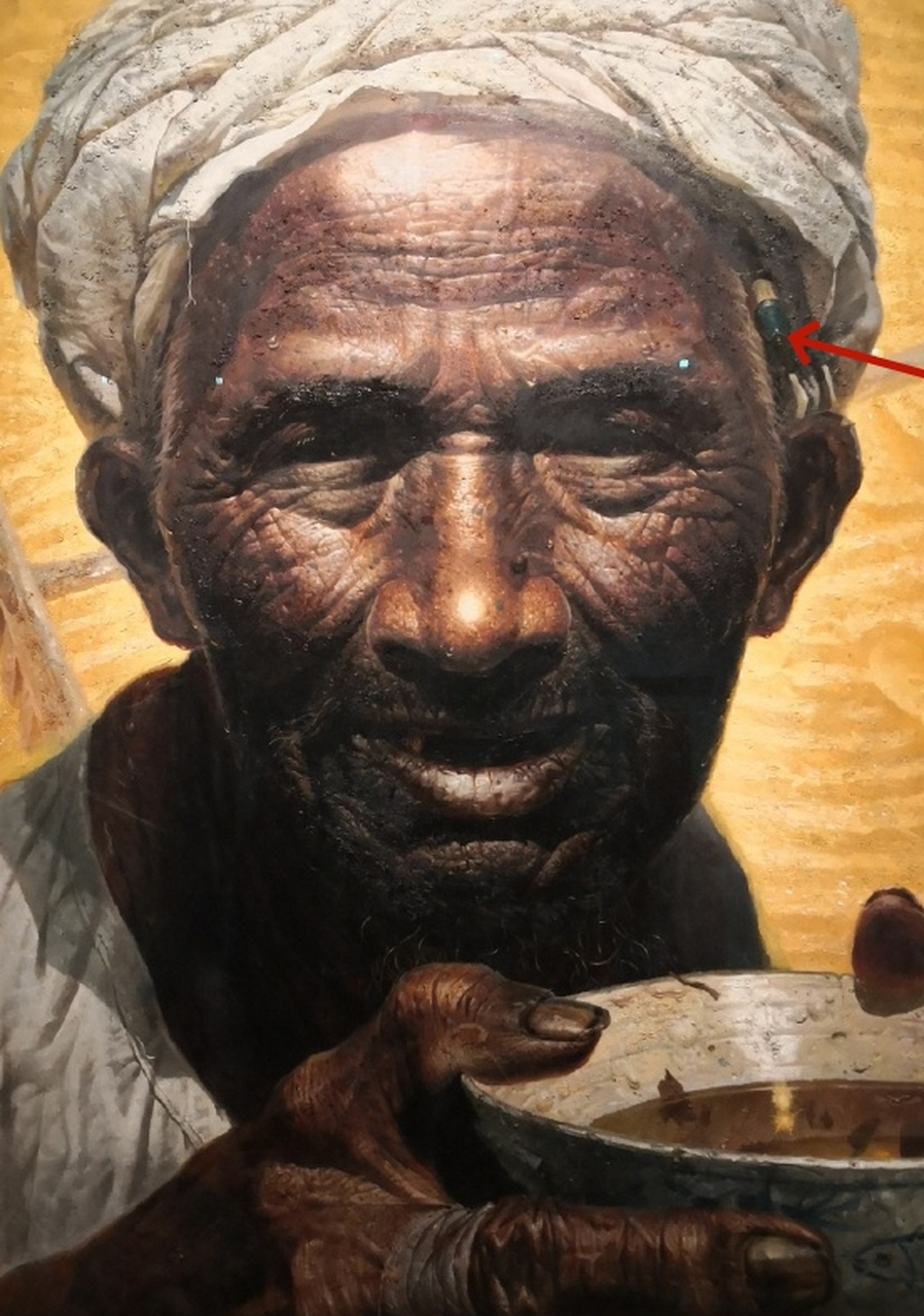 油画与1980年罗中立的原创《父亲》并非一模一样.