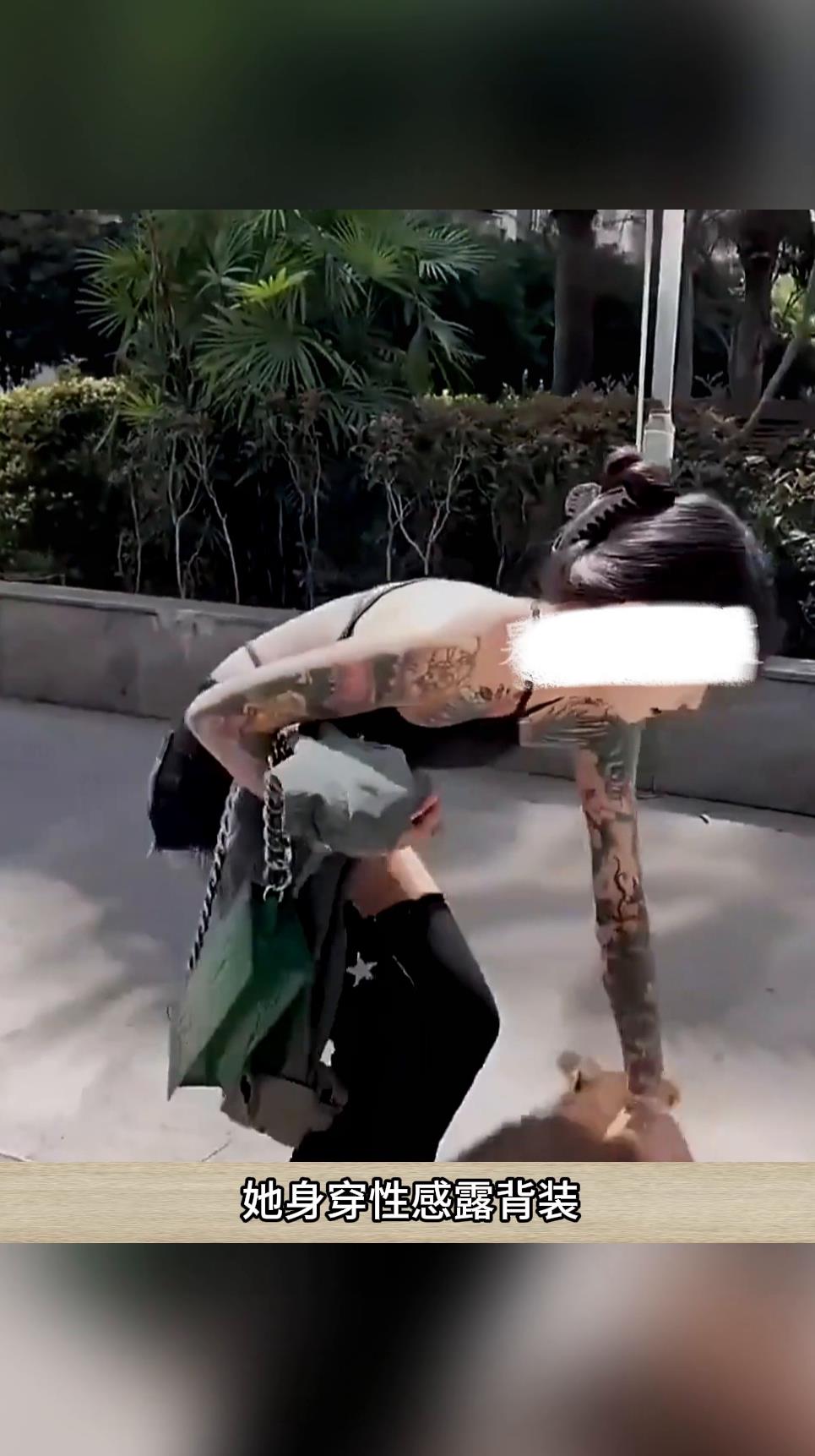 美女穿性感漏背装满背纹身实在炫酷