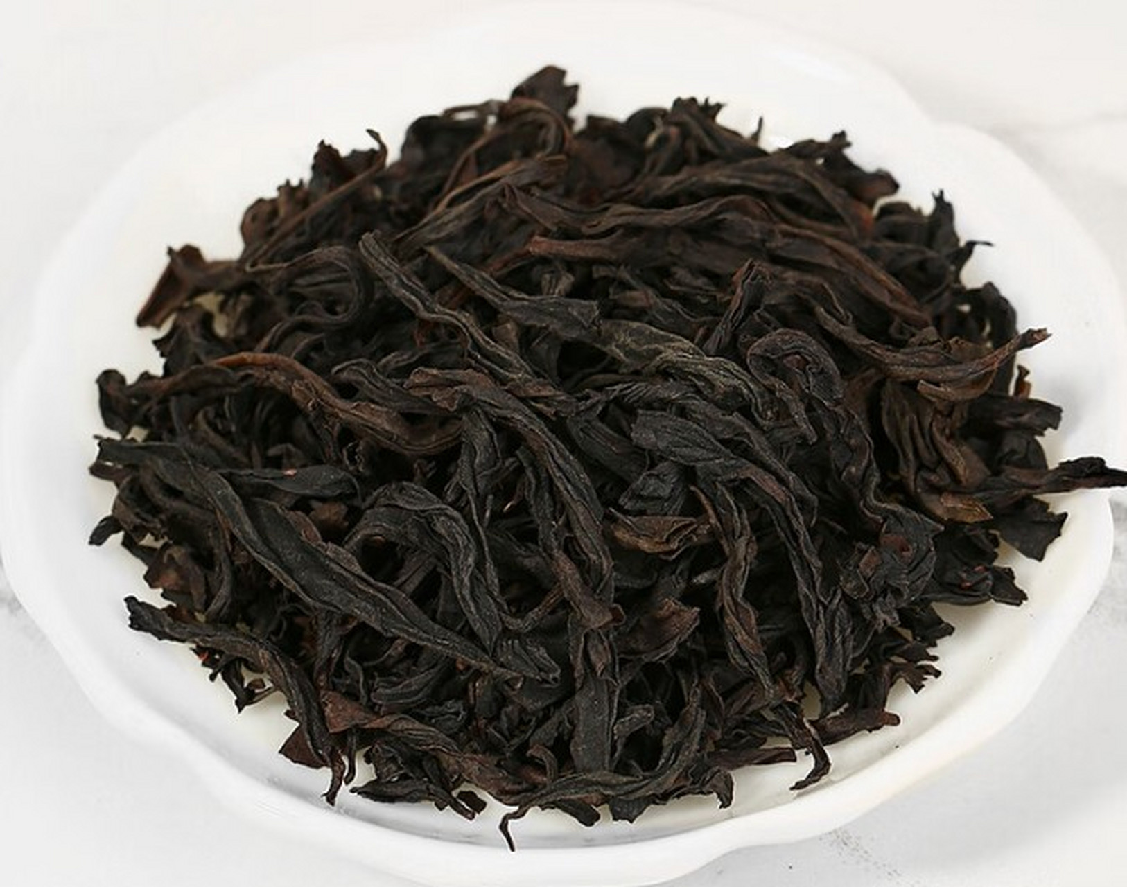 肉桂茶,中国十大名茶之一,以其高锐香气和独特香型闻名.