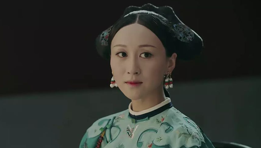 练束梅