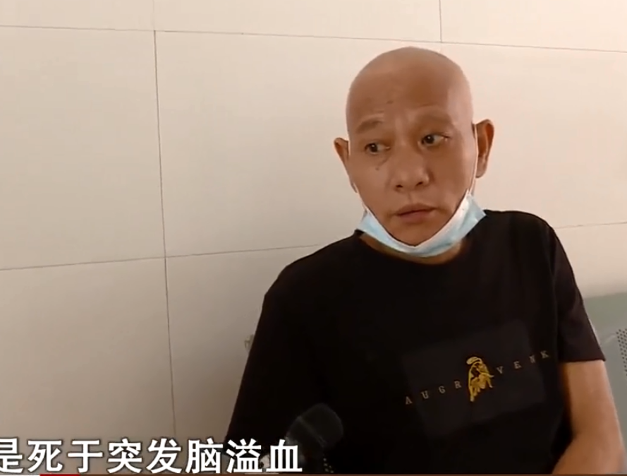 院方通过电话联系了谭克军已经成年的儿子谭斌,当院方向谭斌说明他