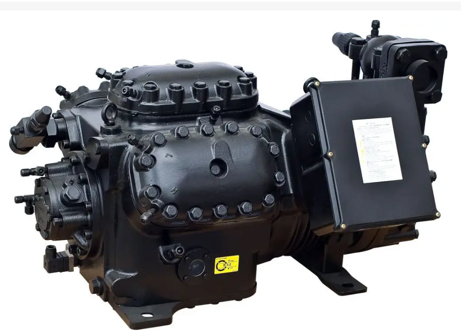 压缩机叶轮转动时,制冷剂蒸汽由吸气室通过进口可导流叶片进入叶轮