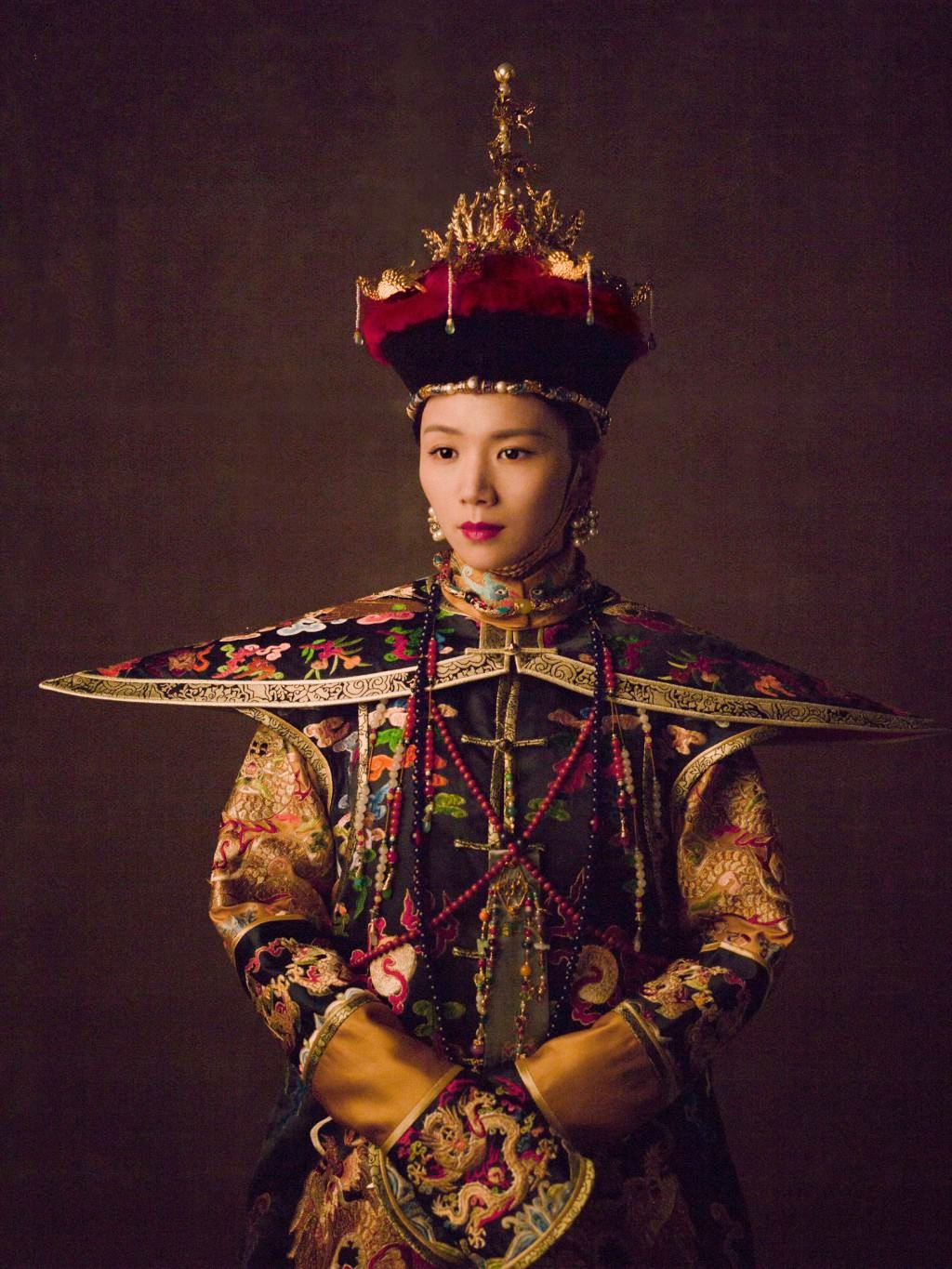 她是按照乾隆三十八年豫妃丧仪标准治理,相比乾隆二十九年忻妃和乾隆