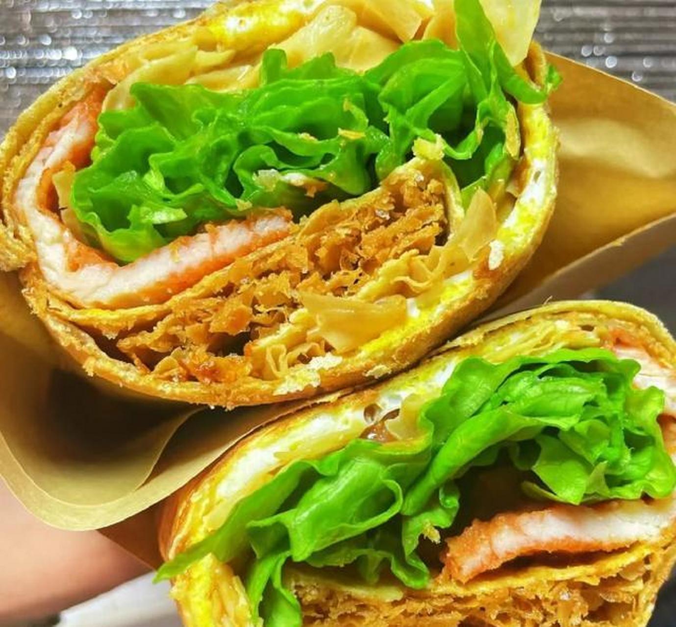 武大郎烧饼:百年传承,口感千姿百态 一,传承百年的经典美味  作为武汉