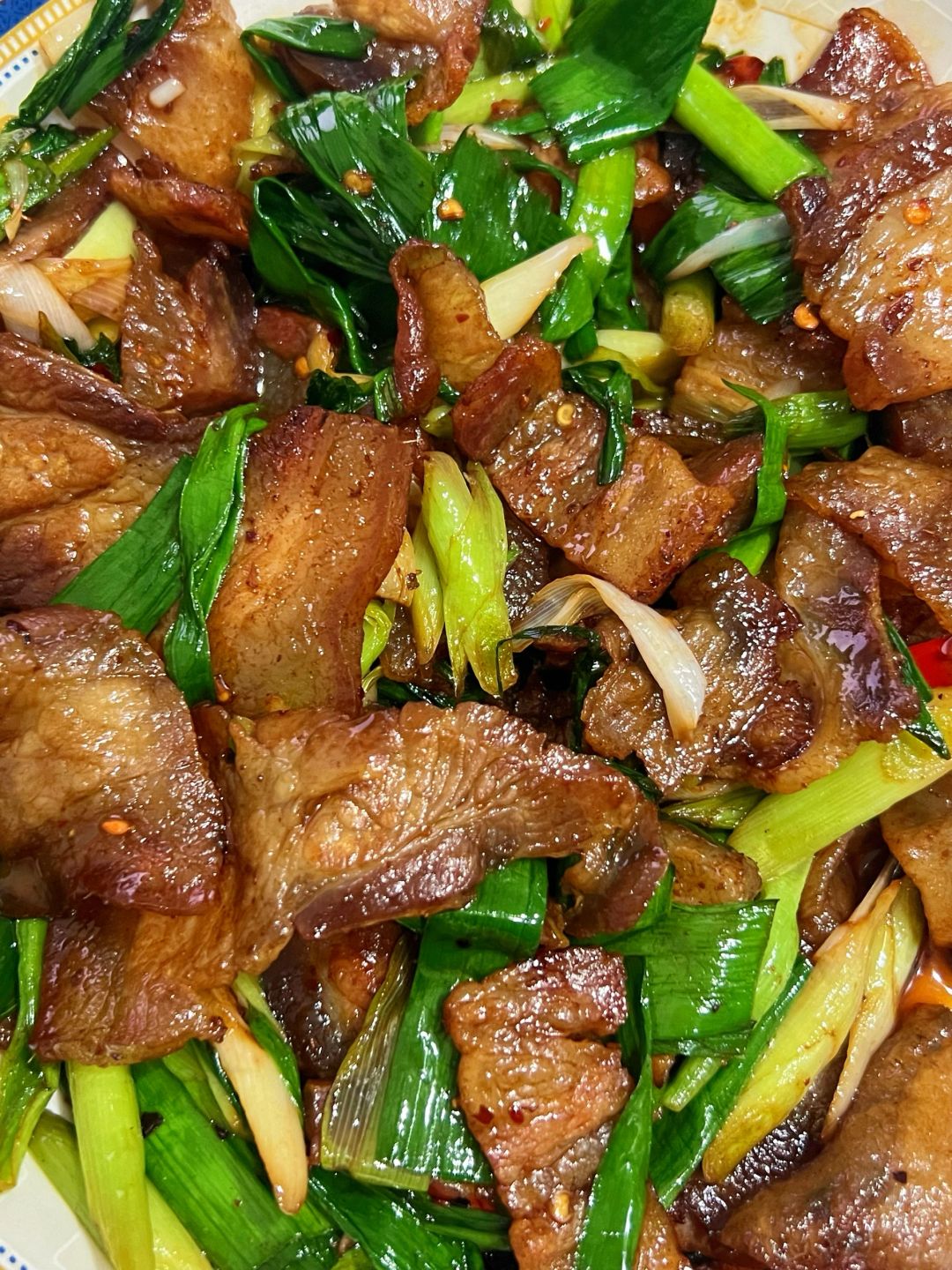 大蒜叶炒腊肉不仅仅是一道菜更是一种情感的寄托