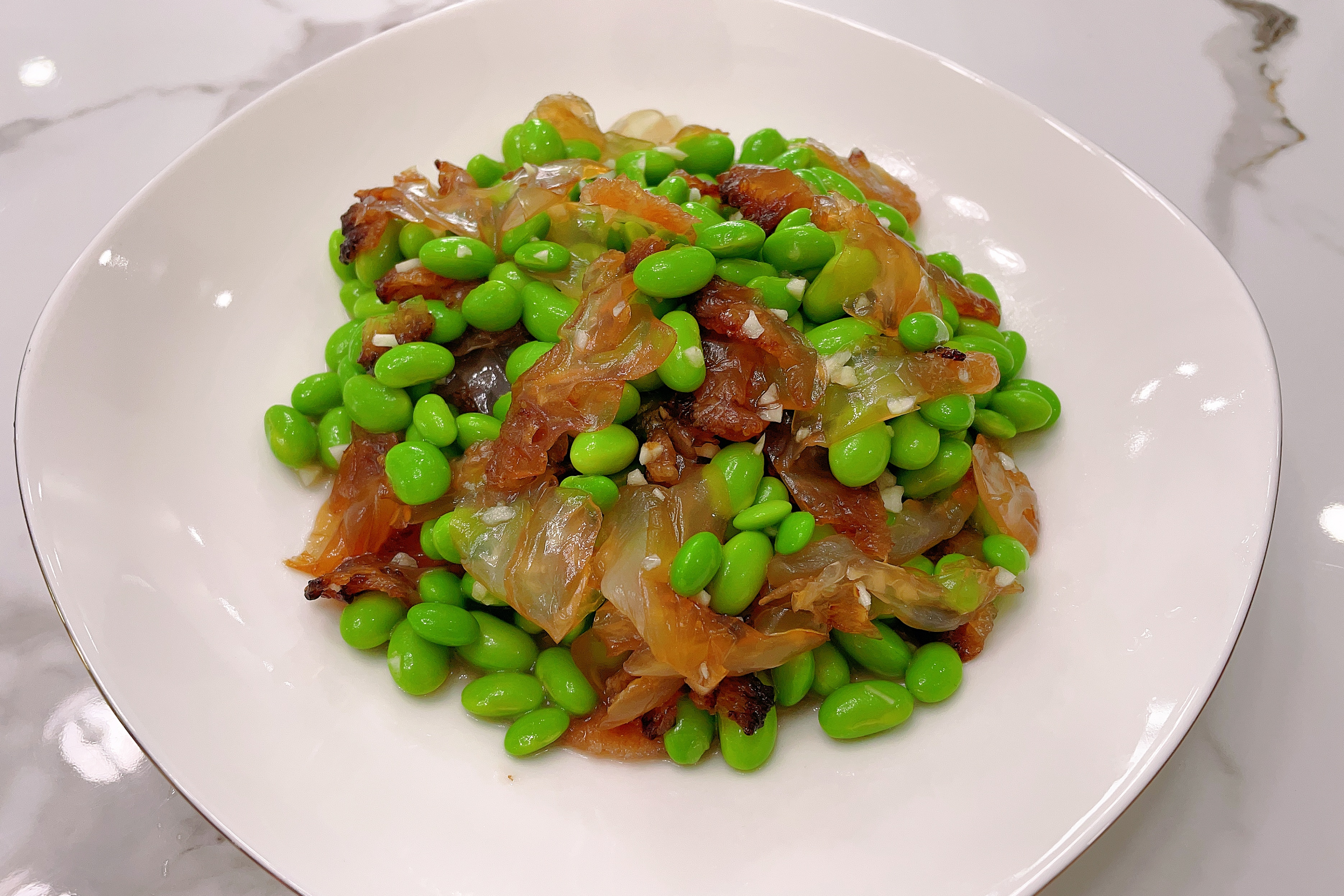 南通特色菜海蜇头拌毛豆是春夏季必备佳肴,简单清爽,带有家乡味道.