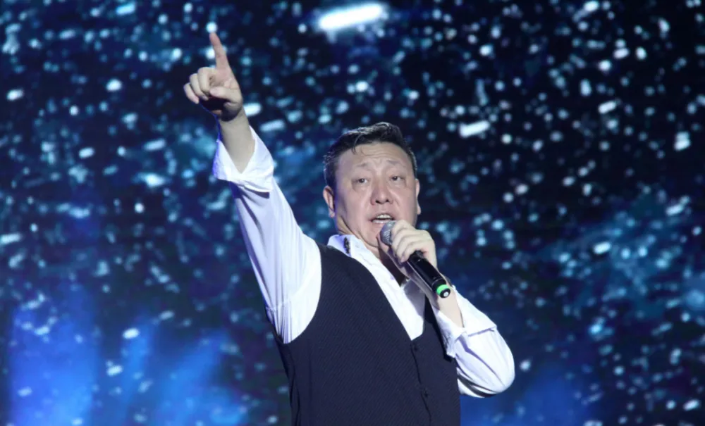 回顾著名歌手韩磊一家四口其乐融融就是儿子让我头痛