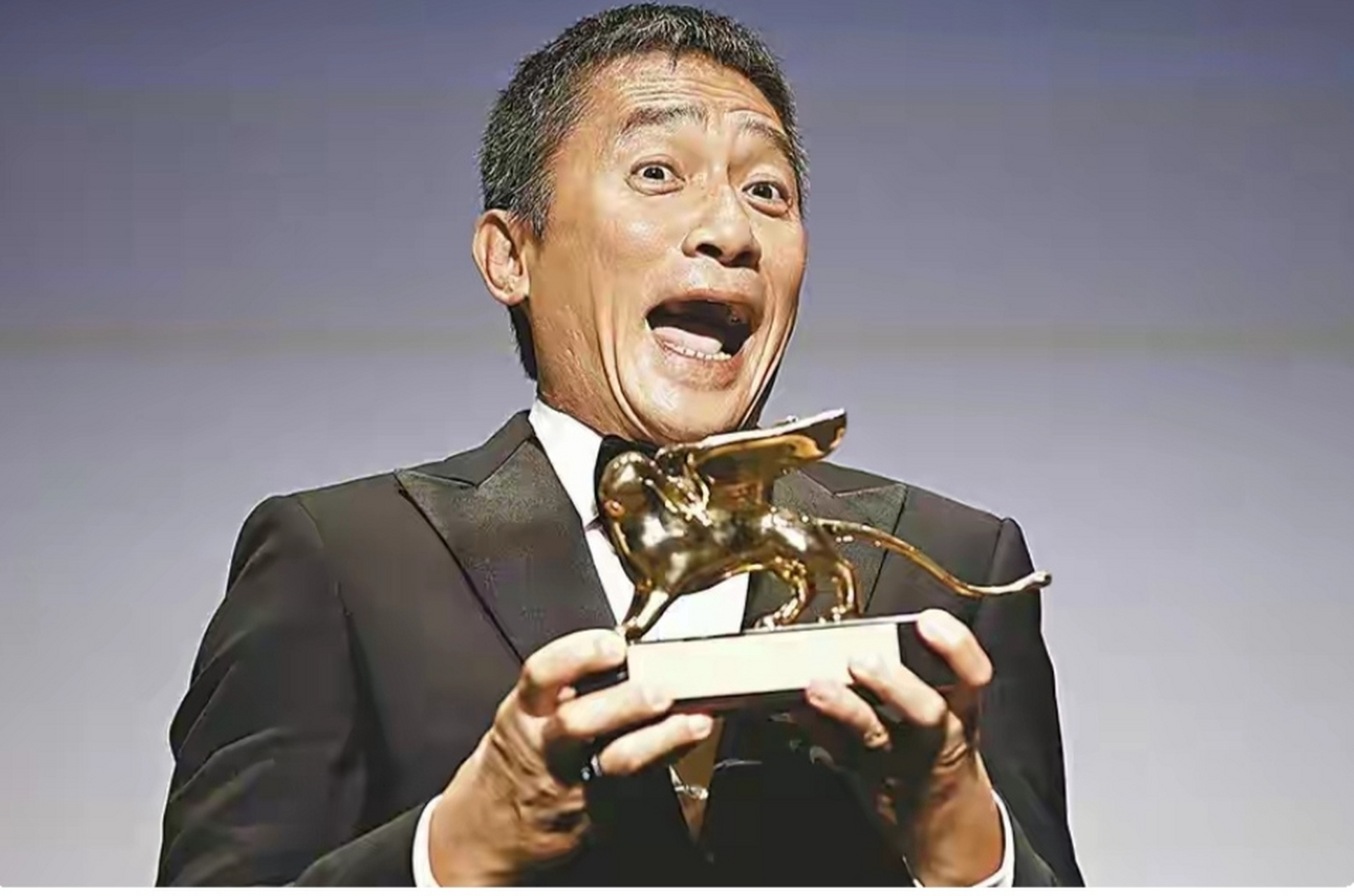 61岁的梁朝伟获80届威尼斯电影节终身成就金狮奖