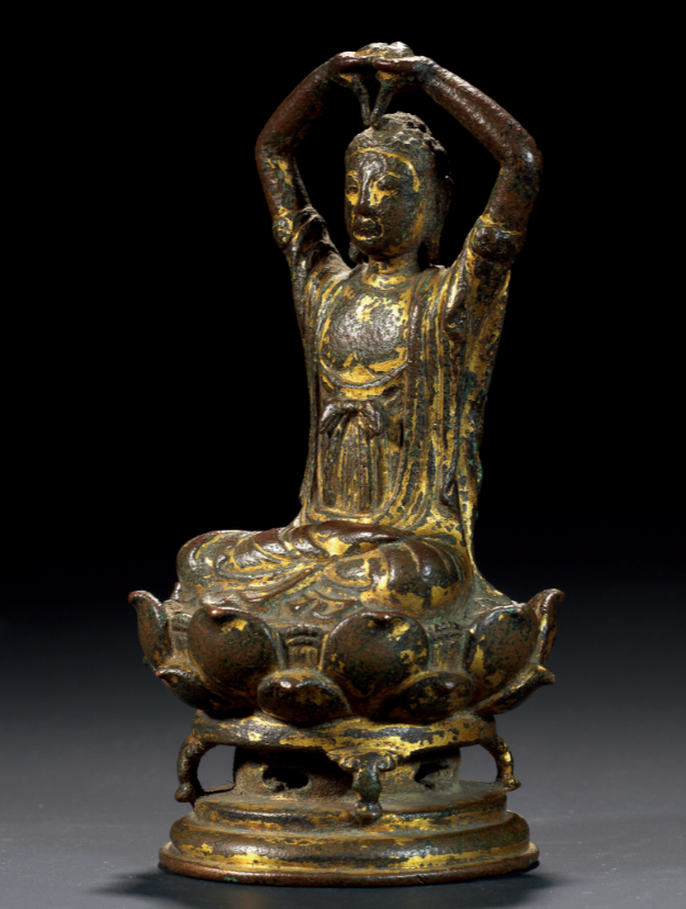 辽代铜鎏金佛像,高12.5厘米,重492克,嘉德拍卖会上以230万元成交.