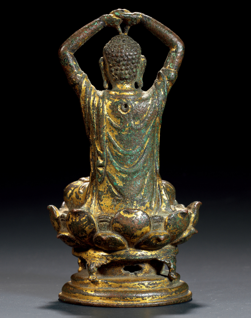 辽代铜鎏金佛像,高12.5厘米,重492克,嘉德拍卖会上以230万元成交.