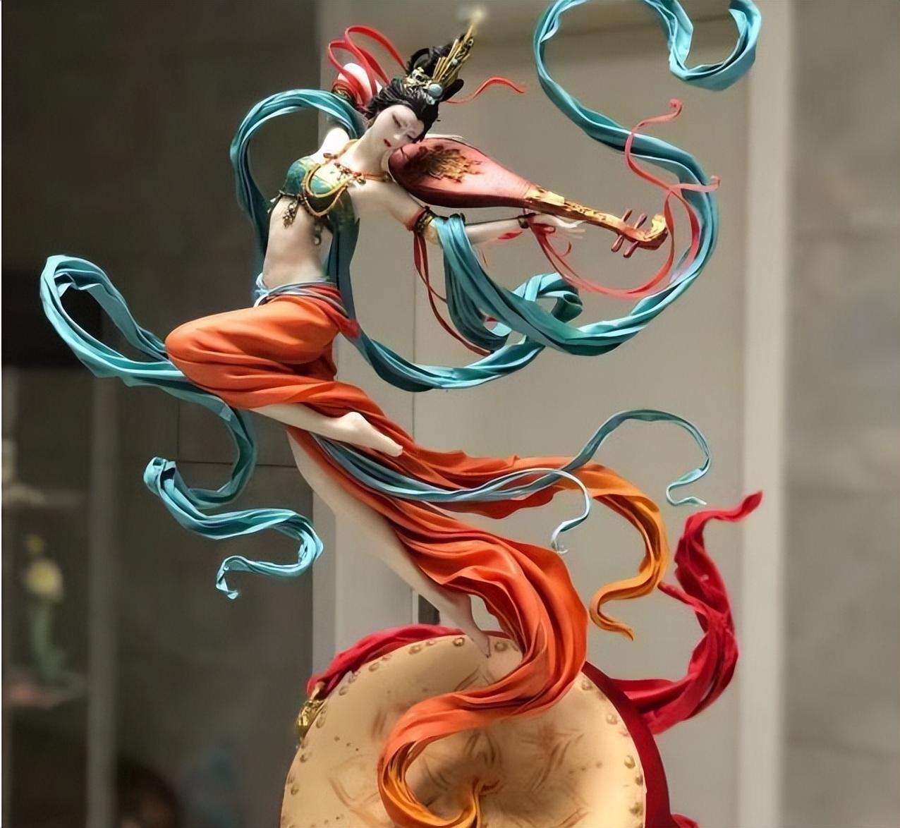 一天,陈志文正在工作室里埋头研究面塑的材料配比.