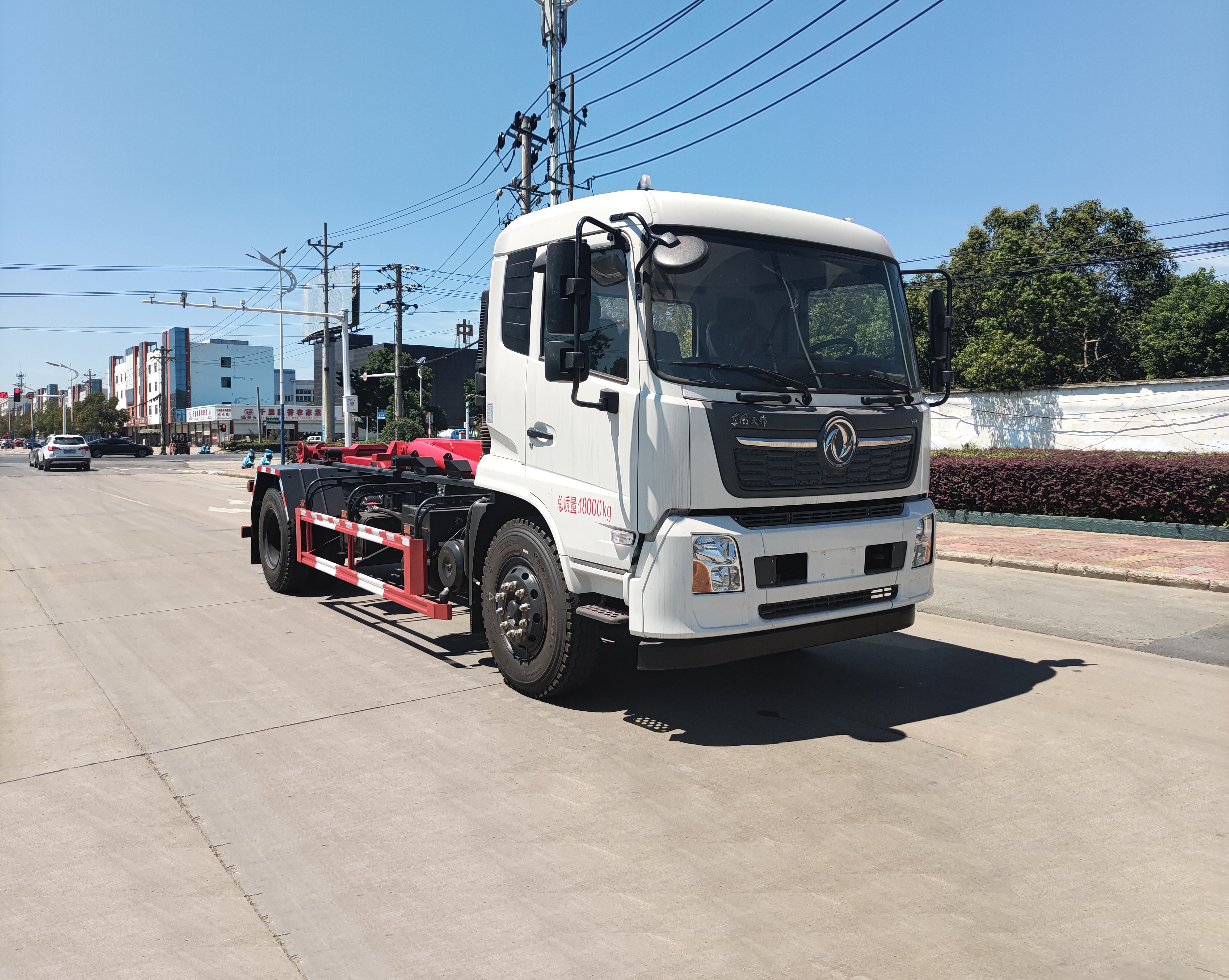 东风天锦18吨勾臂垃圾车 配套12方移动压缩垃圾站