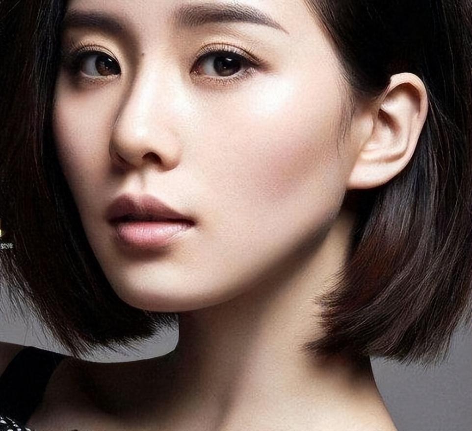 回顾这七位痣美人李建群柔情似水沈傲君楚楚动人