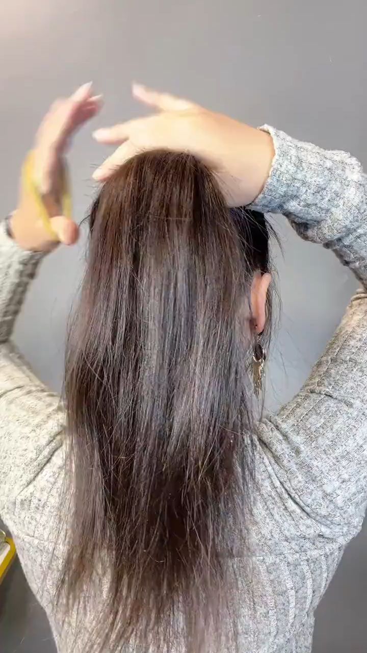 流行新风尚:丸子头扎法大揭秘,轻松打造甜美造型!