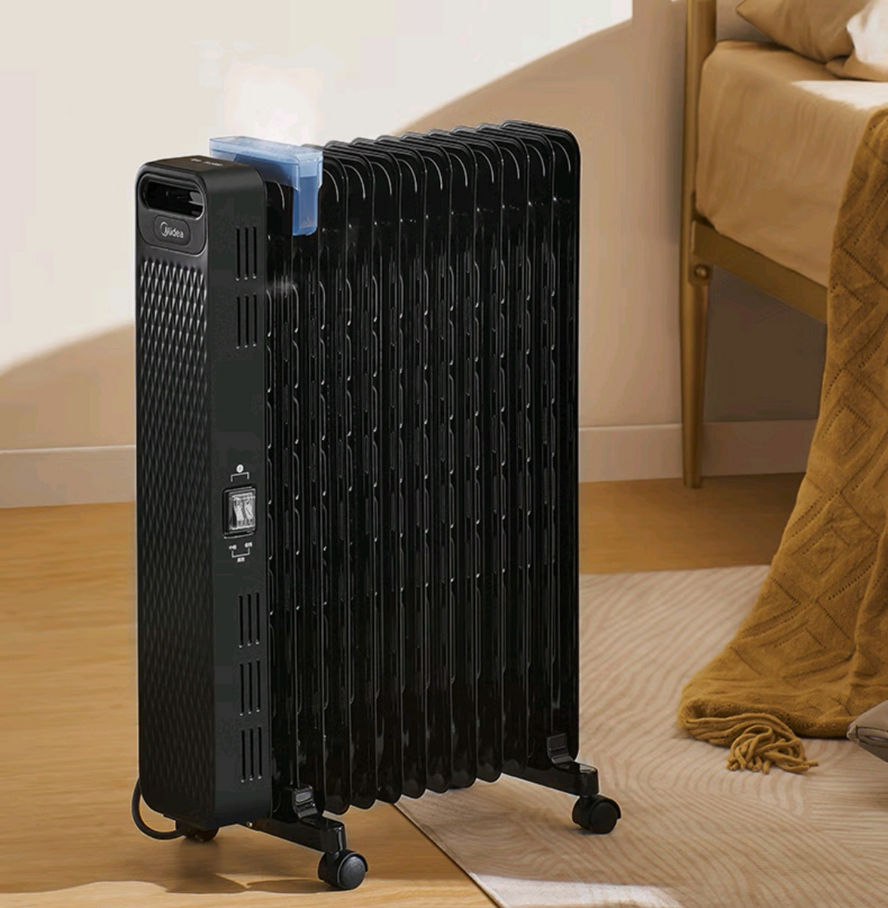 美的油汀取暖器,黑色简约时尚.