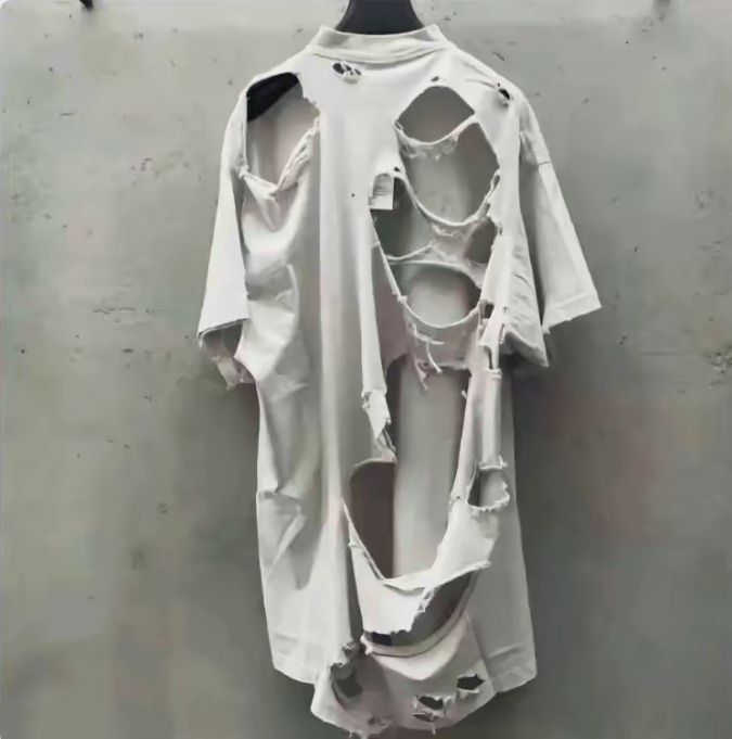 几乎没几块好布,让人不忍直视,说是破 衣服破烂衣服破烂衣服图片破