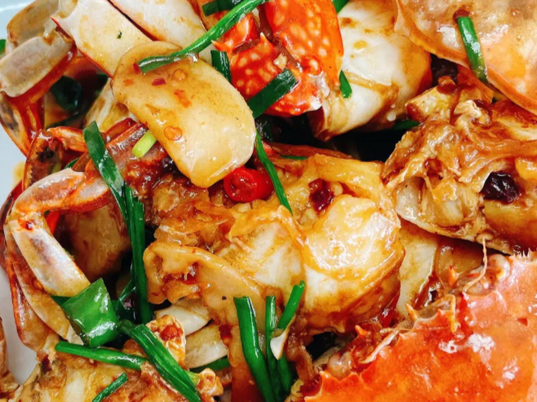 92梭子蟹炒年糕,色泽金黄让人垂涎!