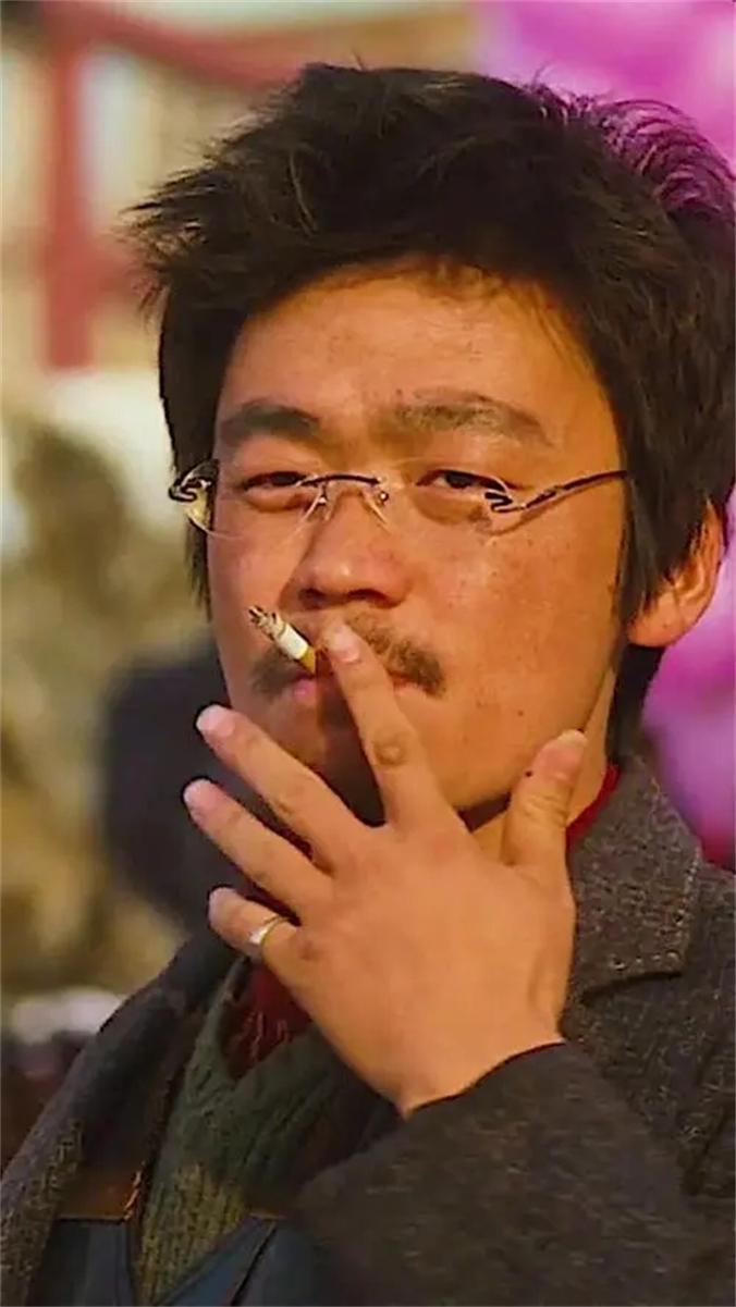 李连杰抽烟图片