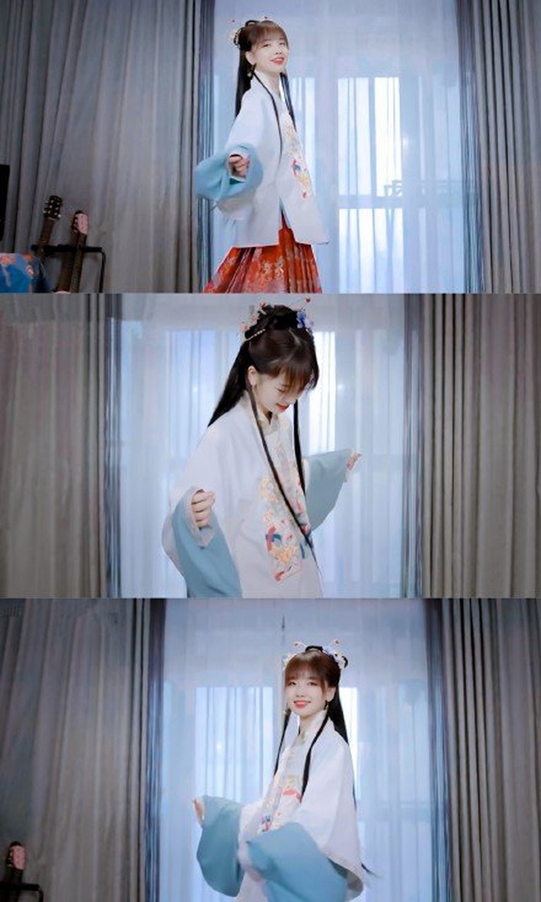 央视主持王冰冰身着汉服甜美可人长发飘飘尽显温柔