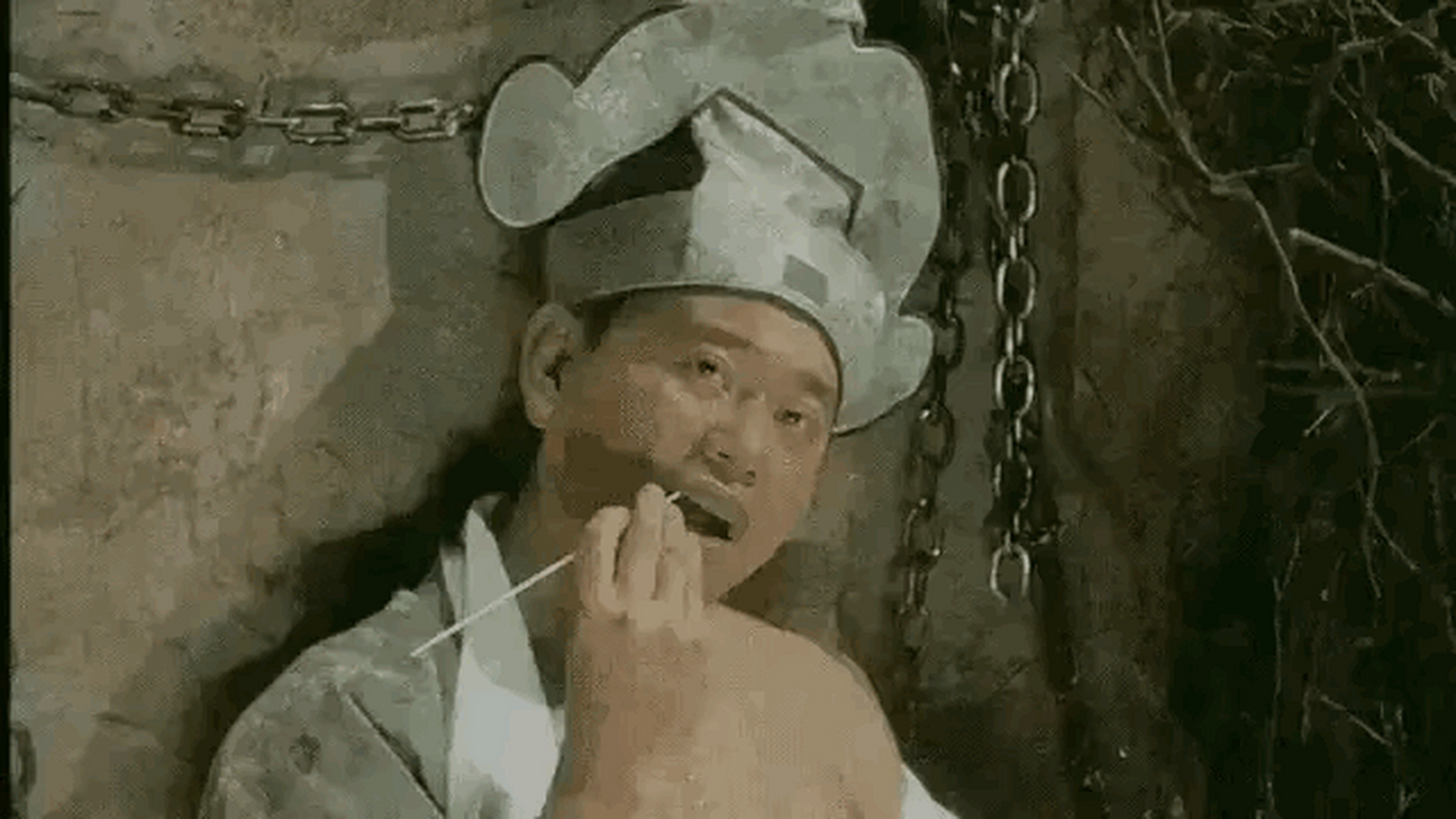 唐伯虎点秋香里面有个片段,祝枝山和石榴姐在柴房里云雨后拿着根大