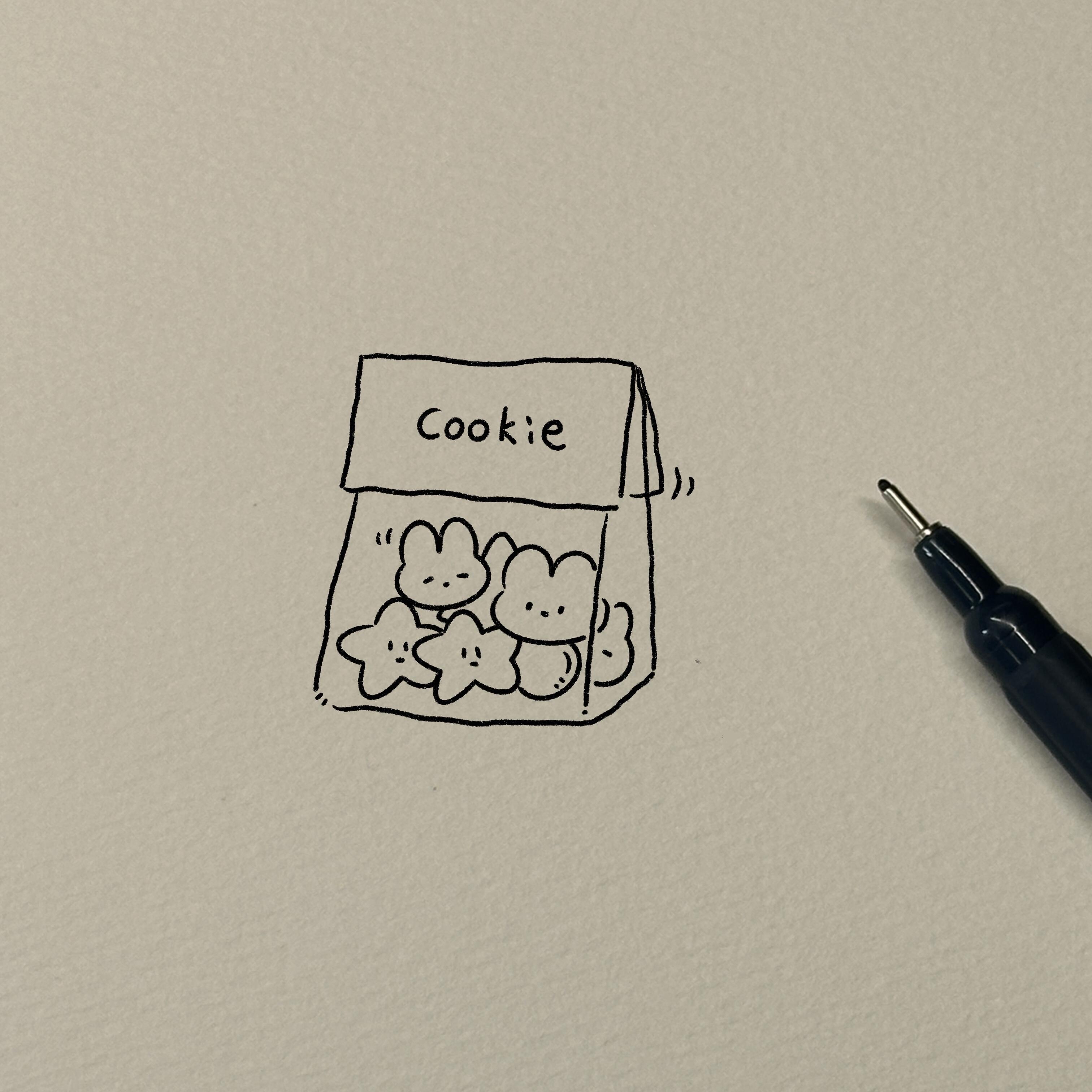 简笔画教程 一袋可爱小饼干 快来试试你们的手