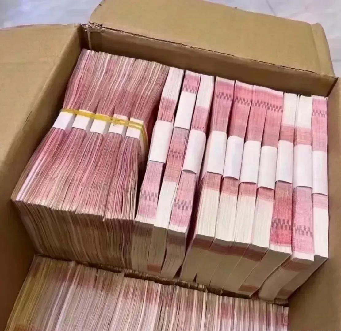 币成堆成捆人民币一捆100元是多少钱现金的图片成捆成堆的人民币图片