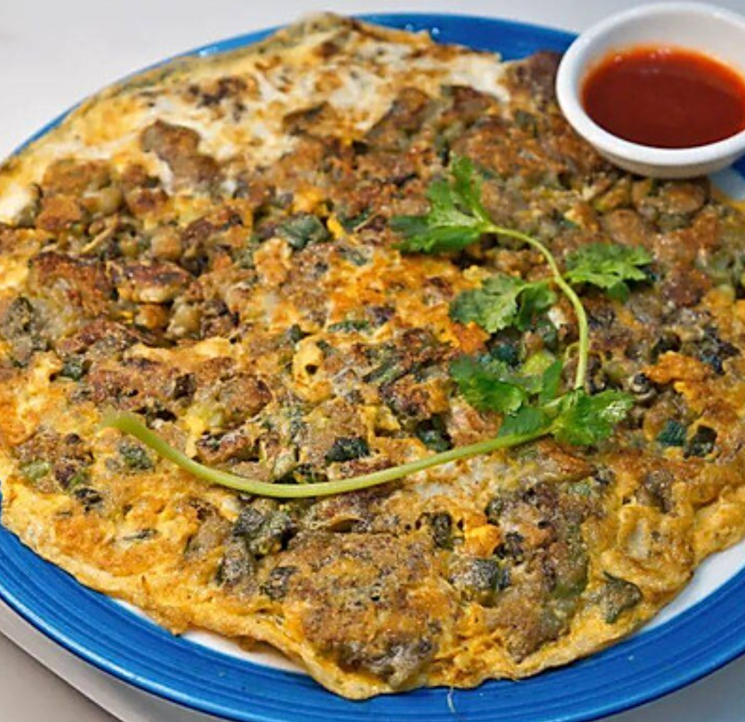 蚵仔煎 蚵仔煎是一道源自福建泉州的传统小吃,也是中国台湾,潮汕地区