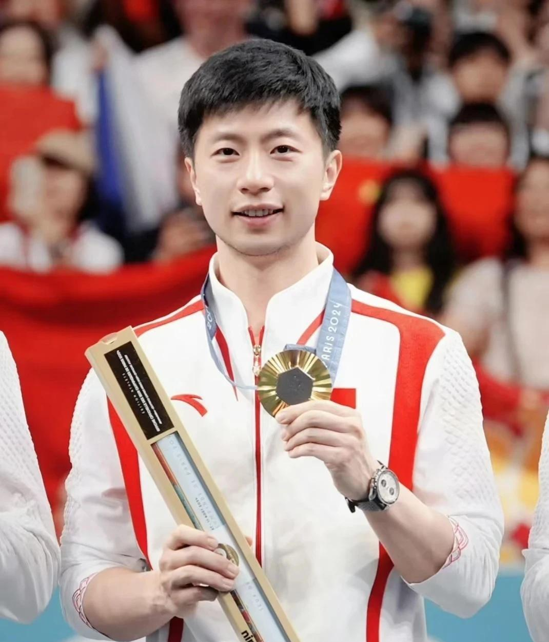 人物中国奥运冠军图片奥运人物图片乒乓球马龙一家照乒乓球冠军马龙
