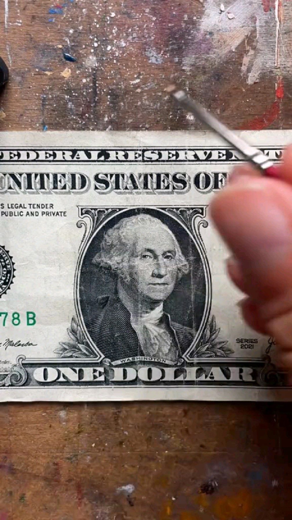 在美元上画人物画