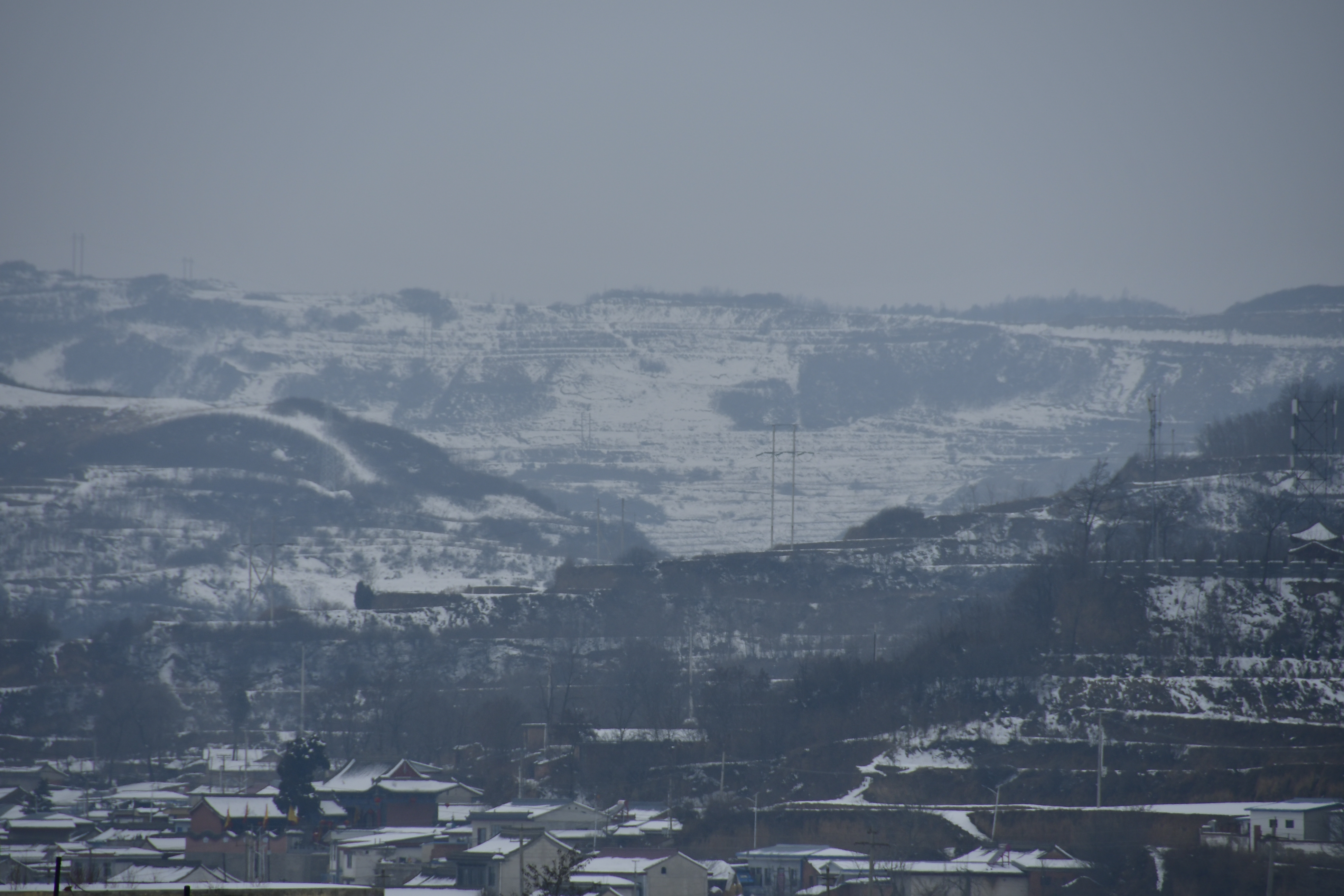 甘肃农村雪景图片