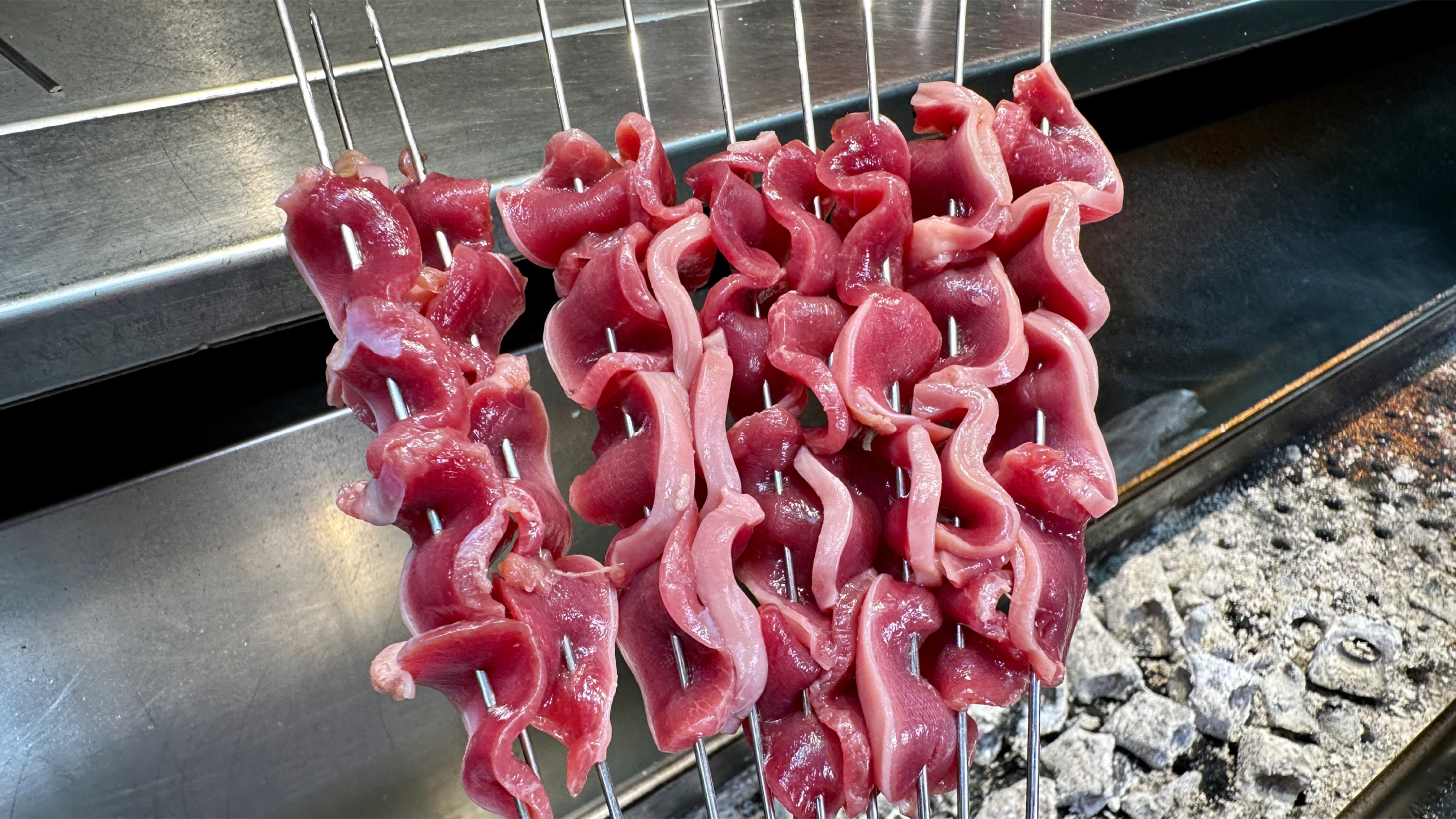 鲜嫩爽滑香辣爽口的香辣嫩鸡胗烤制技巧与方法