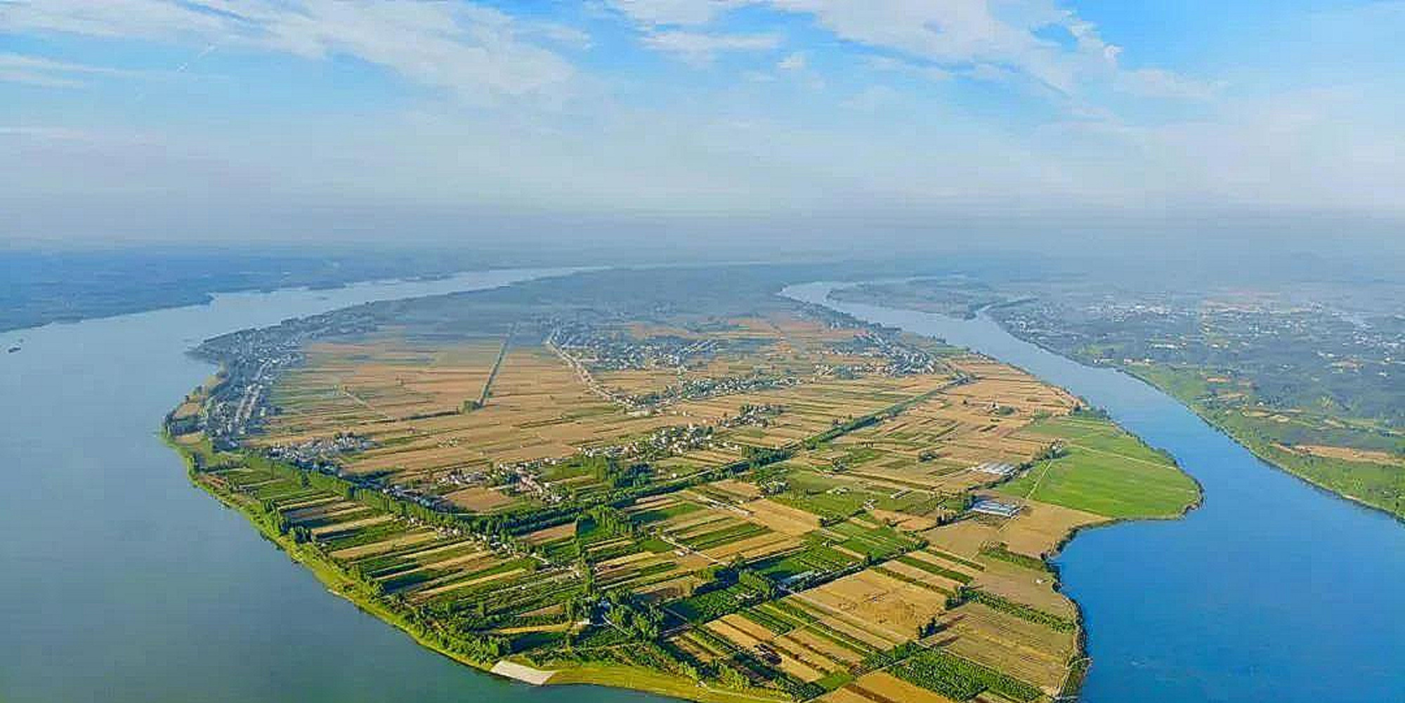 湖北省枝江市百里洲是长江中游最大江心洲,这里的砂梨和棉花有名