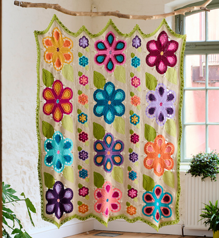 喜欢钩针编织毯子的姐妹们造起来,这款拼花毯子简单易学.色彩艳丽.