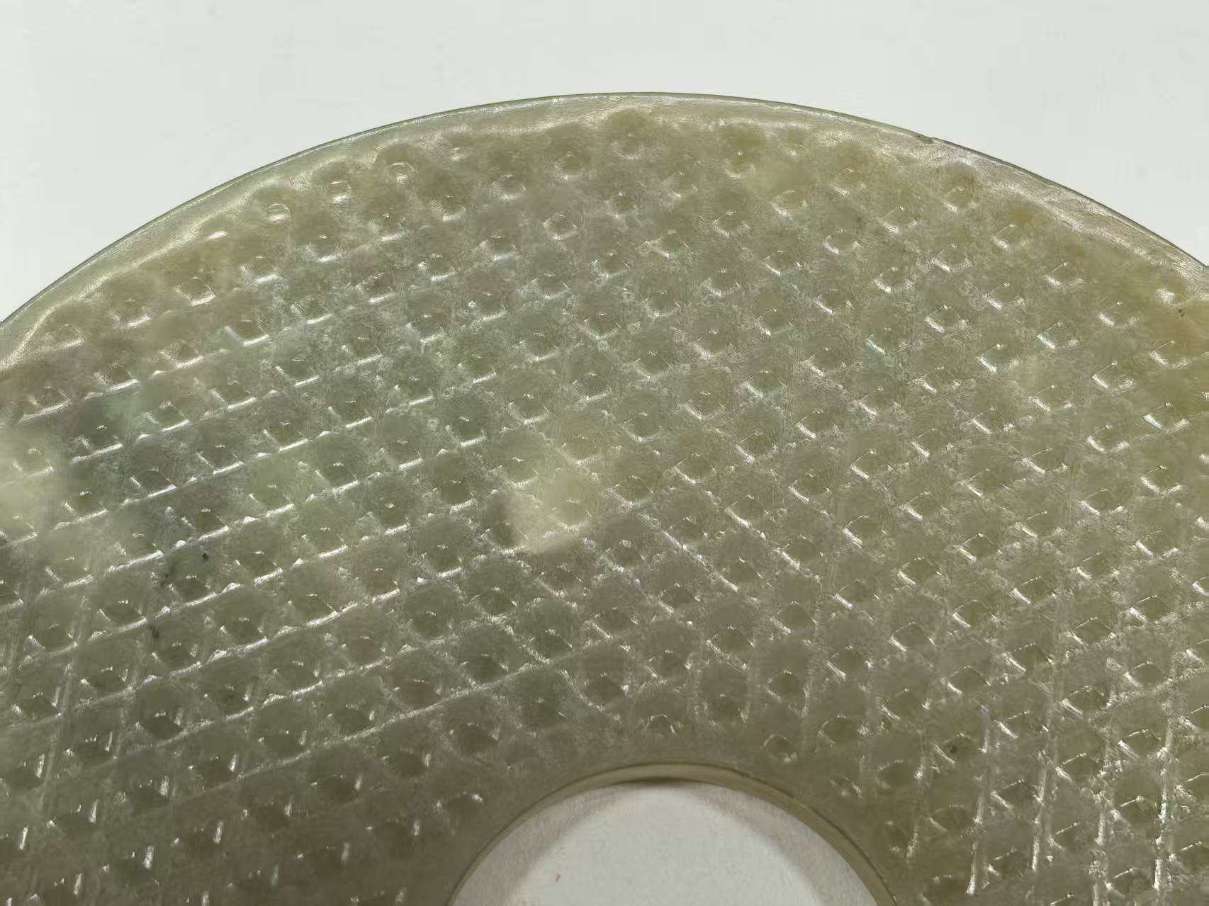 战国末期乳钉纹玉璧:承载千年礼制精神的文物瑰宝